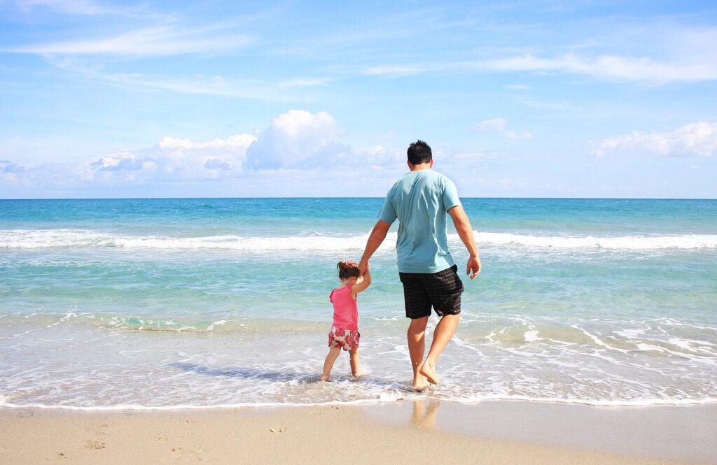 father daughter beach on uk holiday entitlement